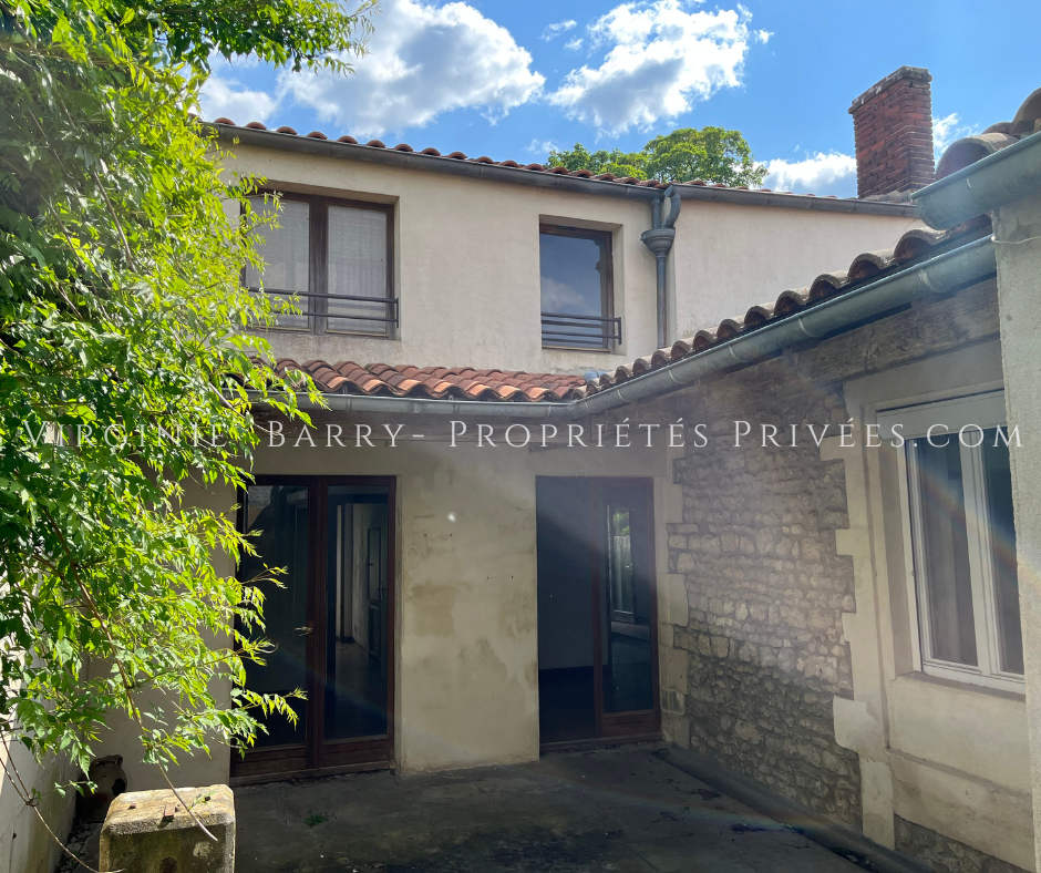 TONNAY-CHARENTE IMMEUBLE COMPOSE DE 4 APPARTEMENTS ET 1 MAISON AVEC JARDIN 7