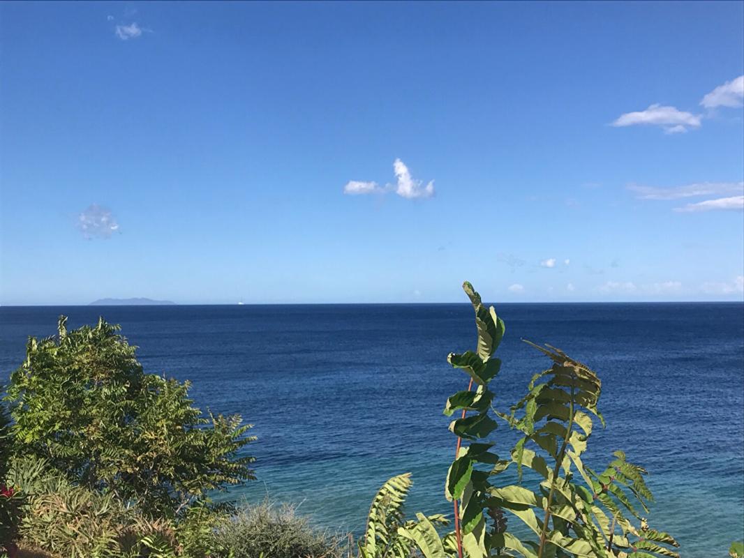 BRANDO Terrain avec permis de construire à Brando : Une rareté à saisir 1