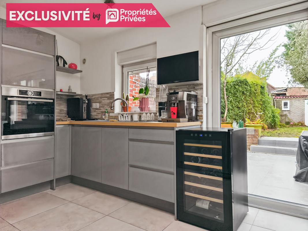 WATTRELOS EN EXCLUSIVITÉ- Maison coup de coeur à Wattrelos, avec jardin et garage!!! 5