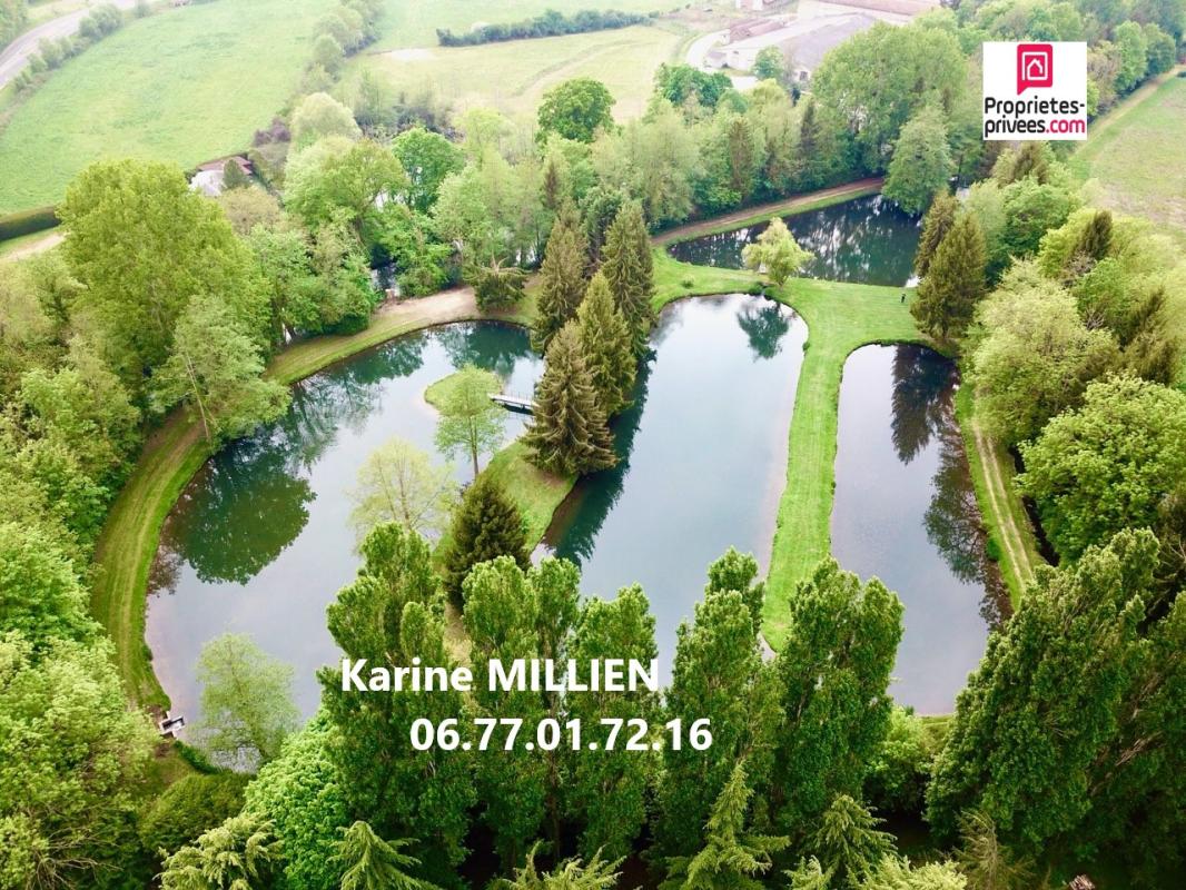 NONANCOURT NONANCOURT 27320 Maison individuelle et lodge aménagé, 4 étangs avec bras de rivière, double garage, terrain de plus de 5 Hectares - 540 000  HAI 1