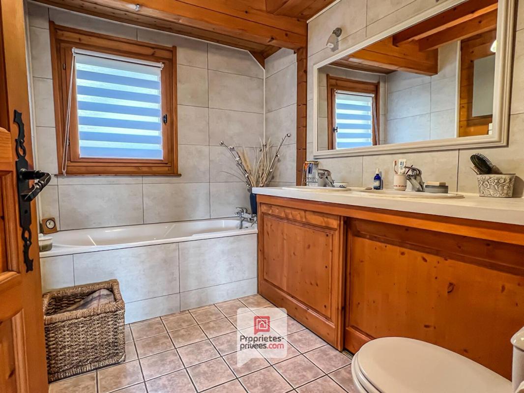 SAINT-HILAIRE Plateau des Petites Roches (38660) - Chalet T6 en madriers + studio + carport + jardin 10