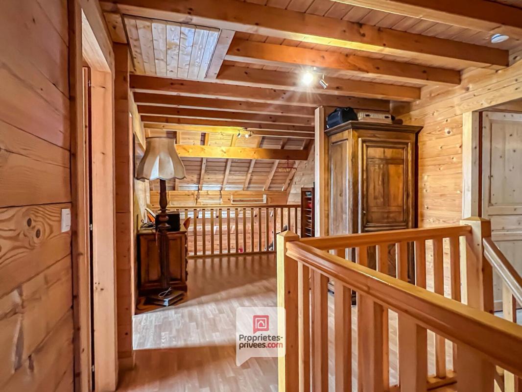 SAINT-HILAIRE Plateau des Petites Roches (38660) - Chalet T6 en madriers + studio + carport + jardin 11