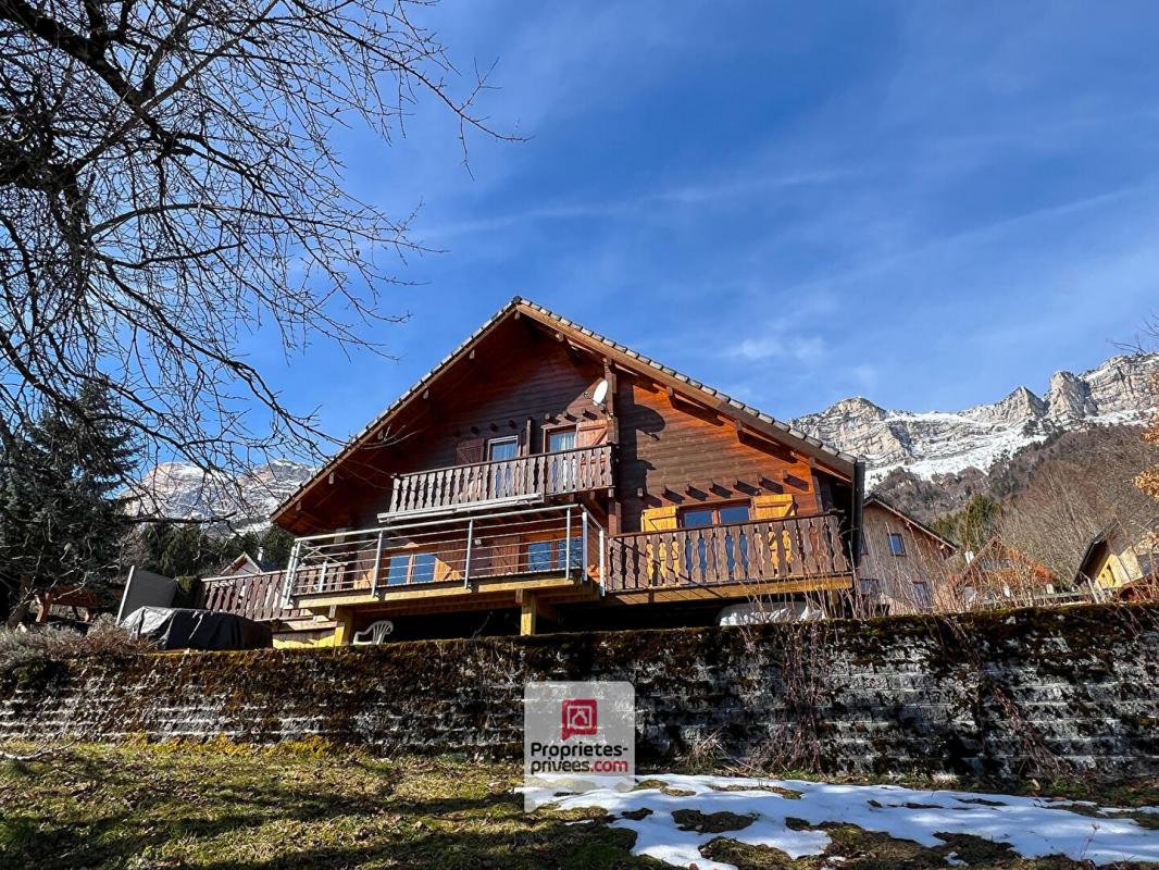 SAINT-HILAIRE Plateau des Petites Roches (38660) - Chalet T6 en madriers + studio + carport + jardin 2
