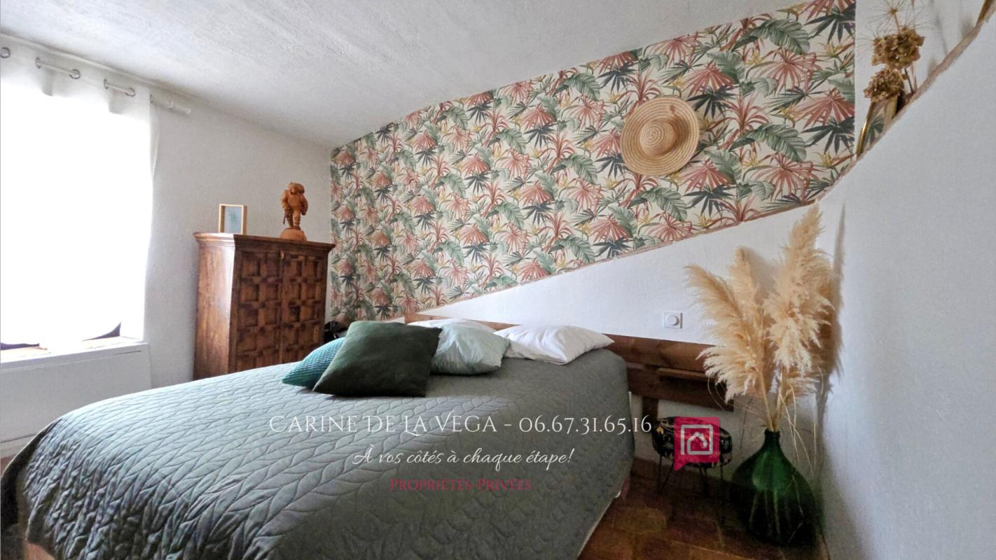 FAUGERES Maison en pierre 87 m2 avec garage, terrasse, jardin 11