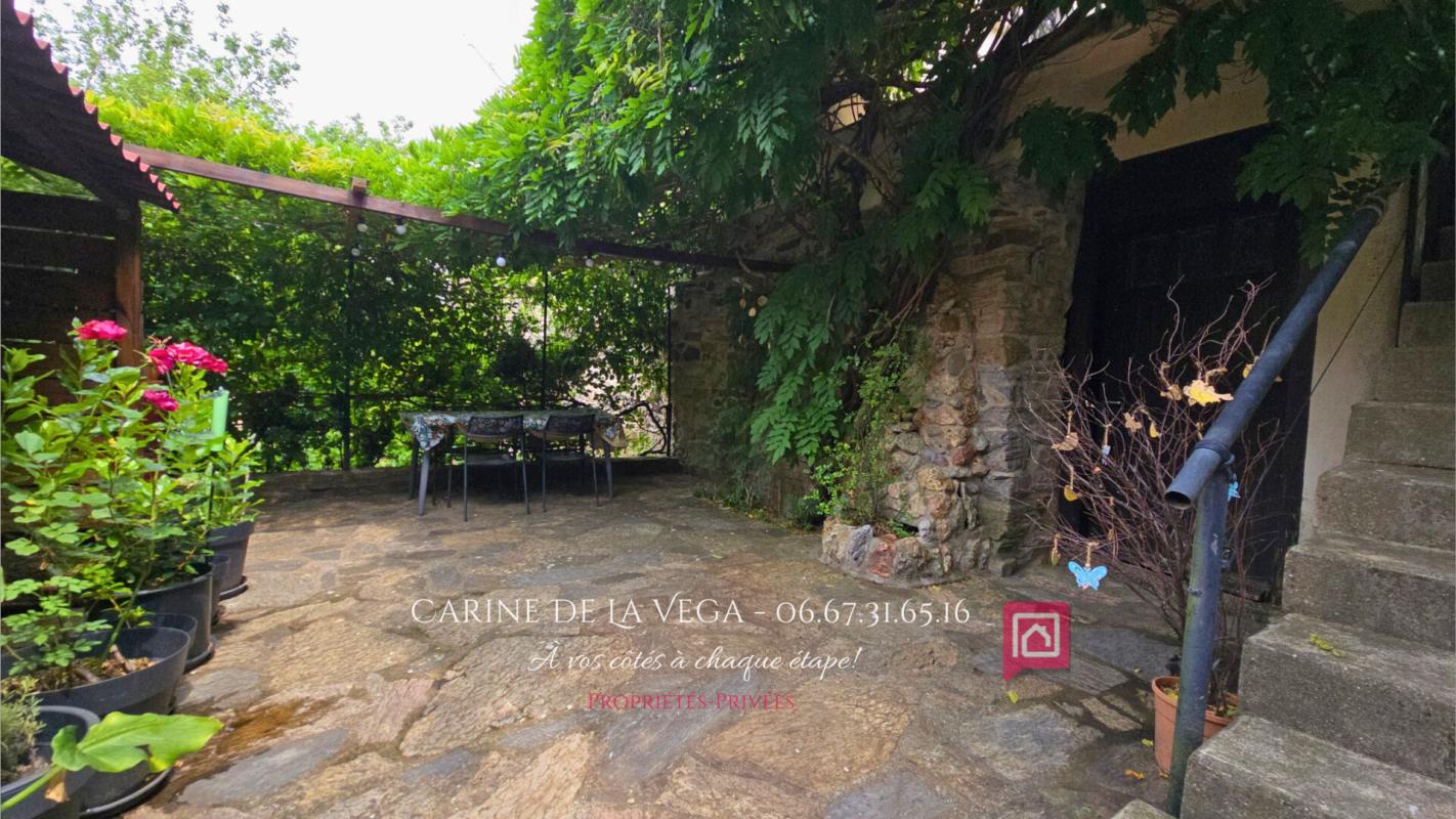 FAUGERES Maison en pierre 87 m2 avec garage, terrasse, jardin 12