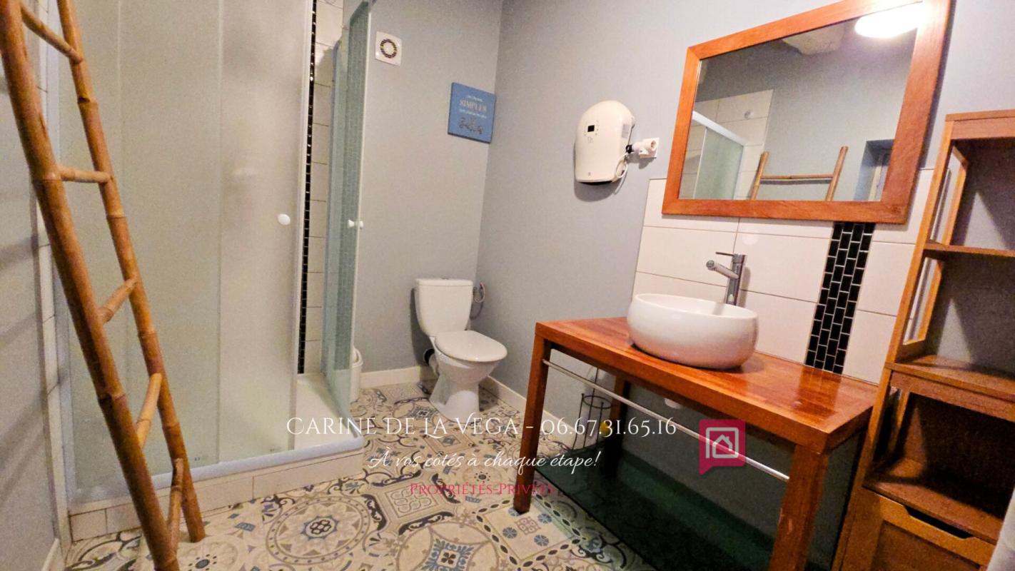 FAUGERES Maison en pierre 87 m2 avec garage, terrasse, jardin 14