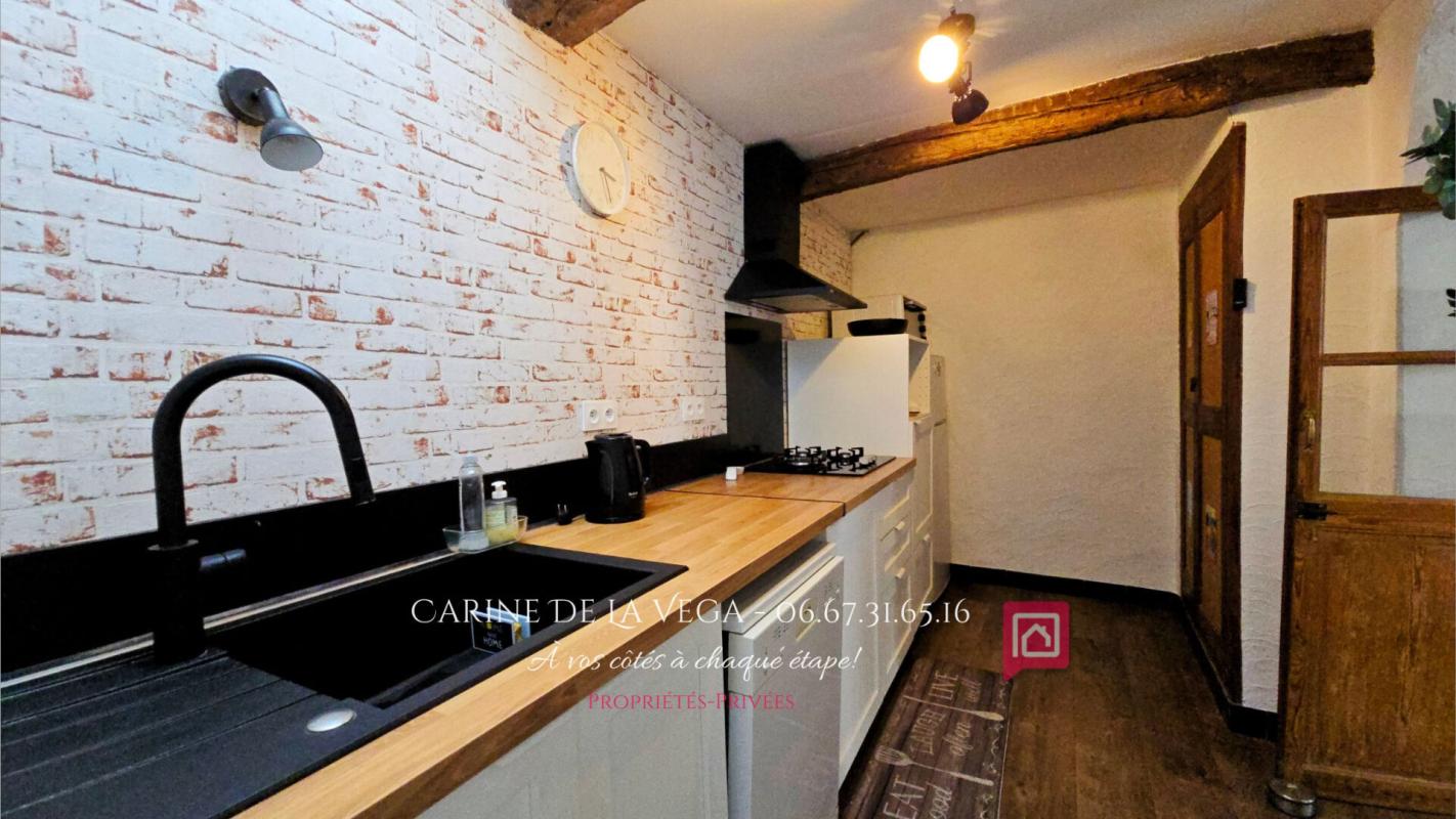 FAUGERES Maison en pierre 87 m2 avec garage, terrasse, jardin 6