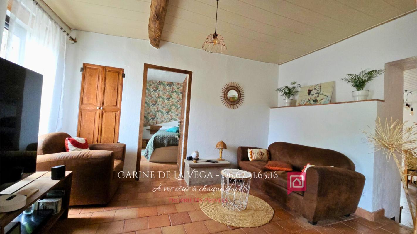 FAUGERES Maison en pierre 87 m2 avec garage, terrasse, jardin 7