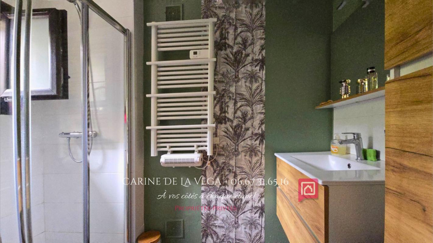 FAUGERES Maison en pierre 87 m2 avec garage, terrasse, jardin 9