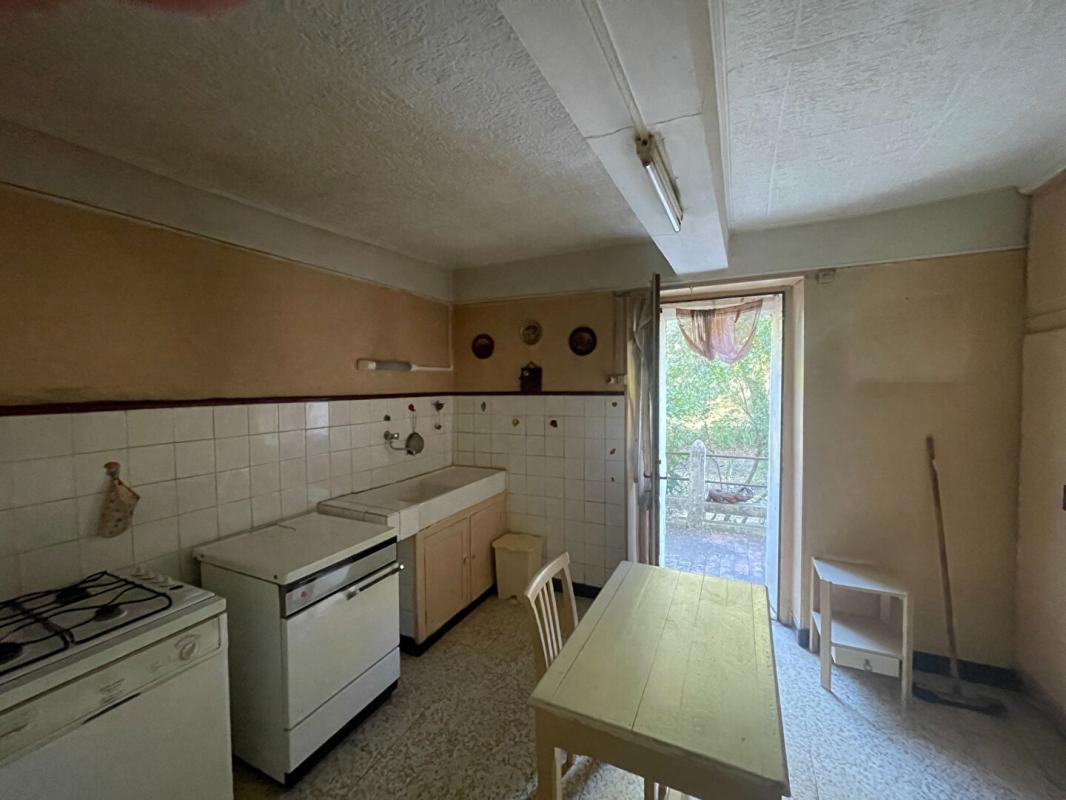 ANDUZE Mas en pierres mitoyen proche Anduze sur terrain constructible de 1900 m2 6