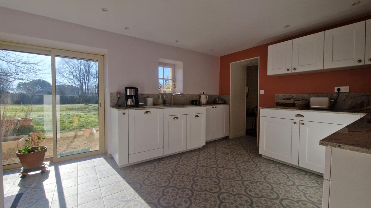 MOUGON-THORIGNÉ Maison Aigondigne 7 pièce(s) 204 m2 1