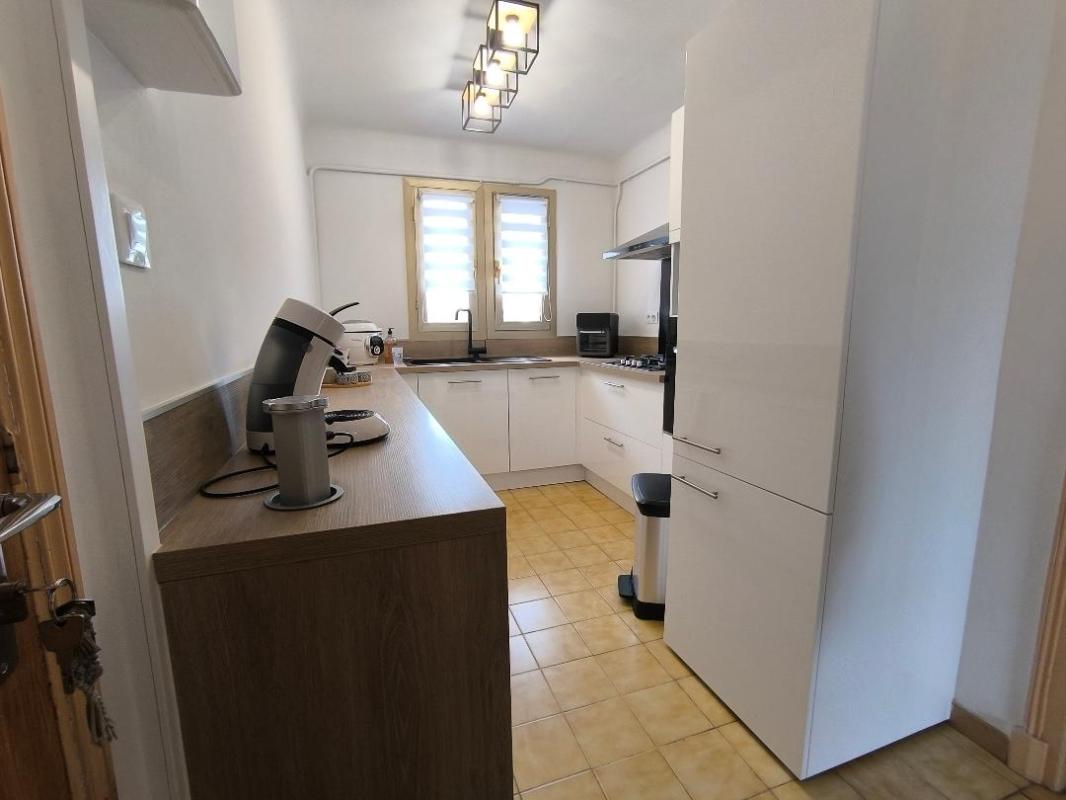 NIMES Nîmes : Centre Appartement  4 pièce(s) 77.96 m2 balcon garage 6