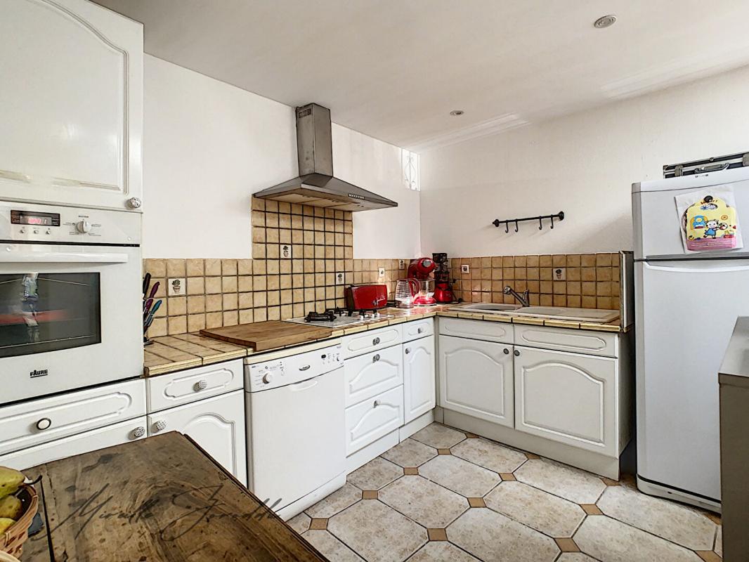 JONQUIERES-SAINT-VINCENT Jonquieres Saint Vincent maison en pierre 114m² avec terrasse et garage 5