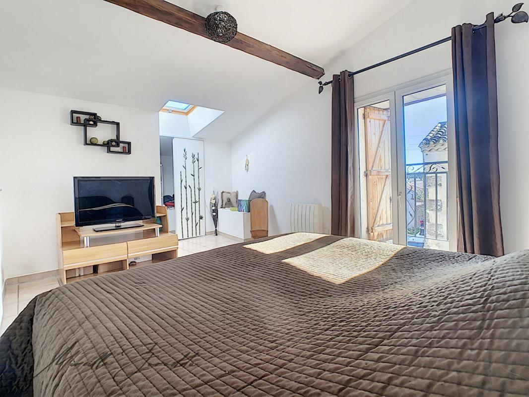 JONQUIERES-SAINT-VINCENT Jonquieres Saint Vincent maison en pierre 114m² avec terrasse et garage 7