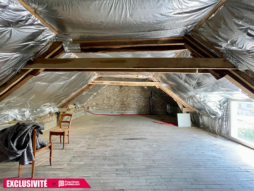 CARENTOIR Maison en pierre 100m2 dans le bourg 11