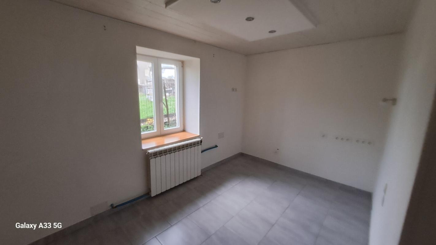 VIOMENIL Maison mitoyenne ( Viomenil  88260) 5