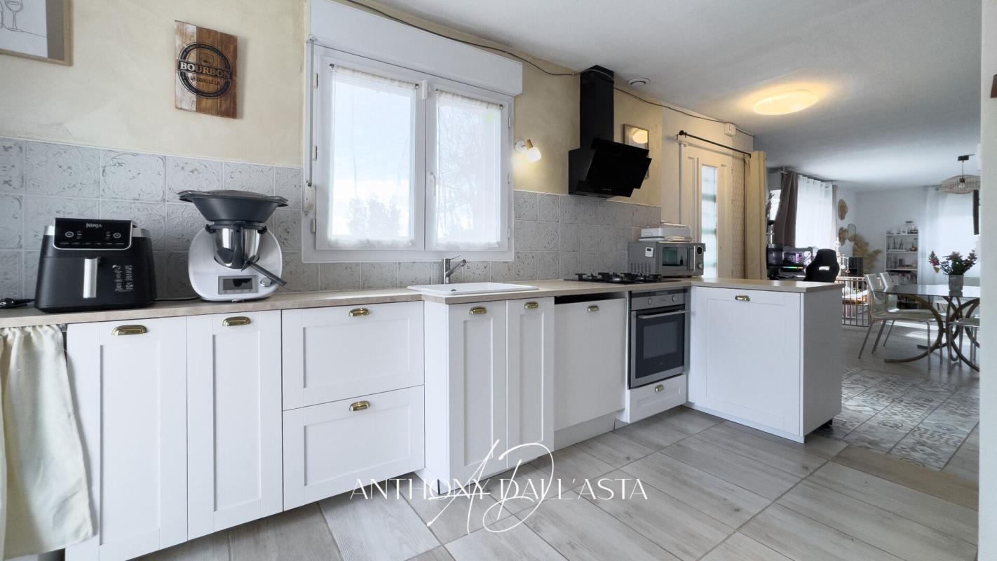 MOUSSOULENS Maison- 3 chambres- salon- séjour- cuisine- garage- jardin- terrasse 6