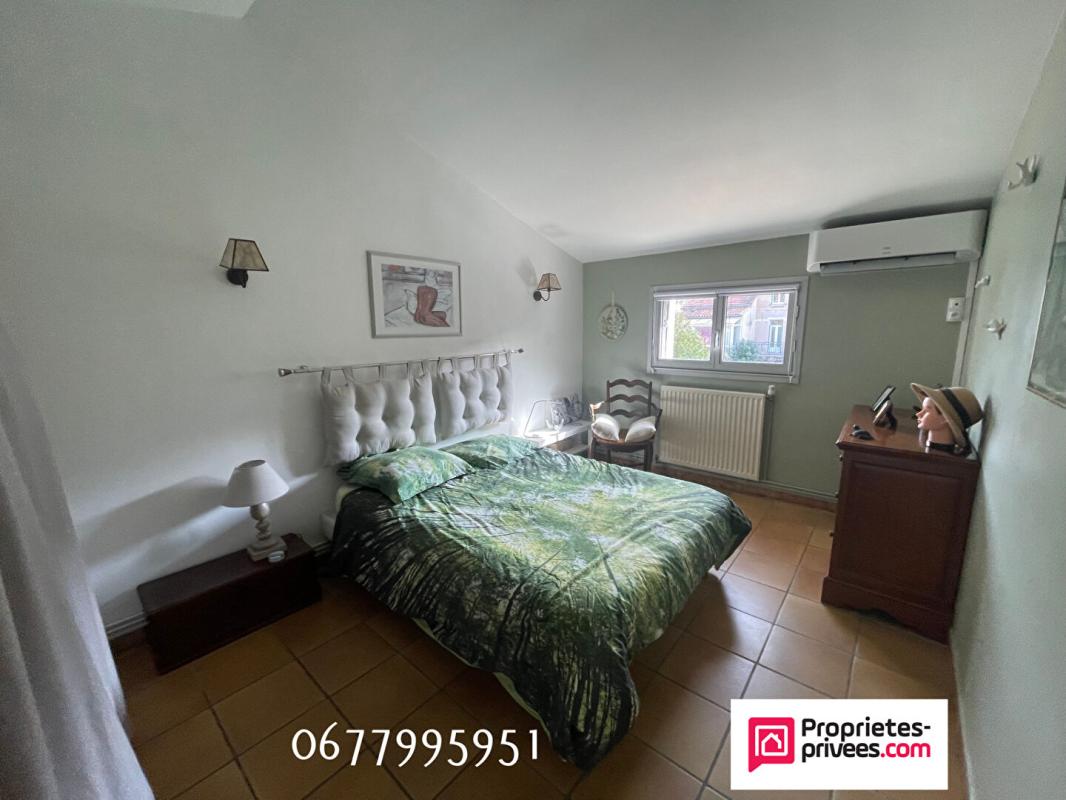 ALES Maison 4 pièce(s) 64.51 m2 2 CHAMBRES 1 PIECE A VIVRE 1 GARAGE 41 M2 12