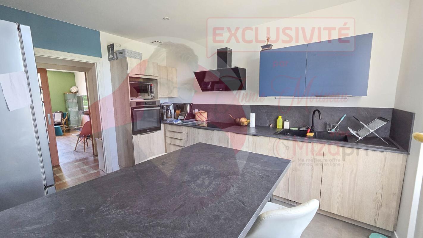 ISSOIRE Maison de 155 m² avec 4 chambres, garage et jardin en centre ville 14