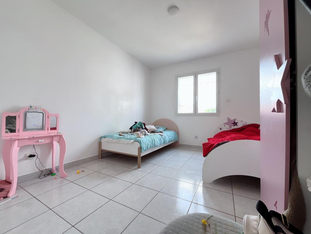 PERPIGNAN Magnifique maison en R+1 de 190 m²  comprenant 6 chambres sur un terrain 3 faces de 450 m² dans un secteur calme 12