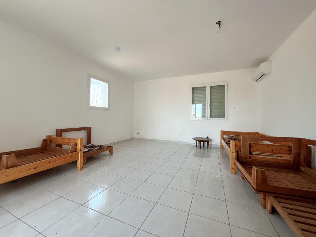 PERPIGNAN Magnifique maison en R+1 de 190 m²  comprenant 6 chambres sur un terrain 3 faces de 450 m² dans un secteur calme 14