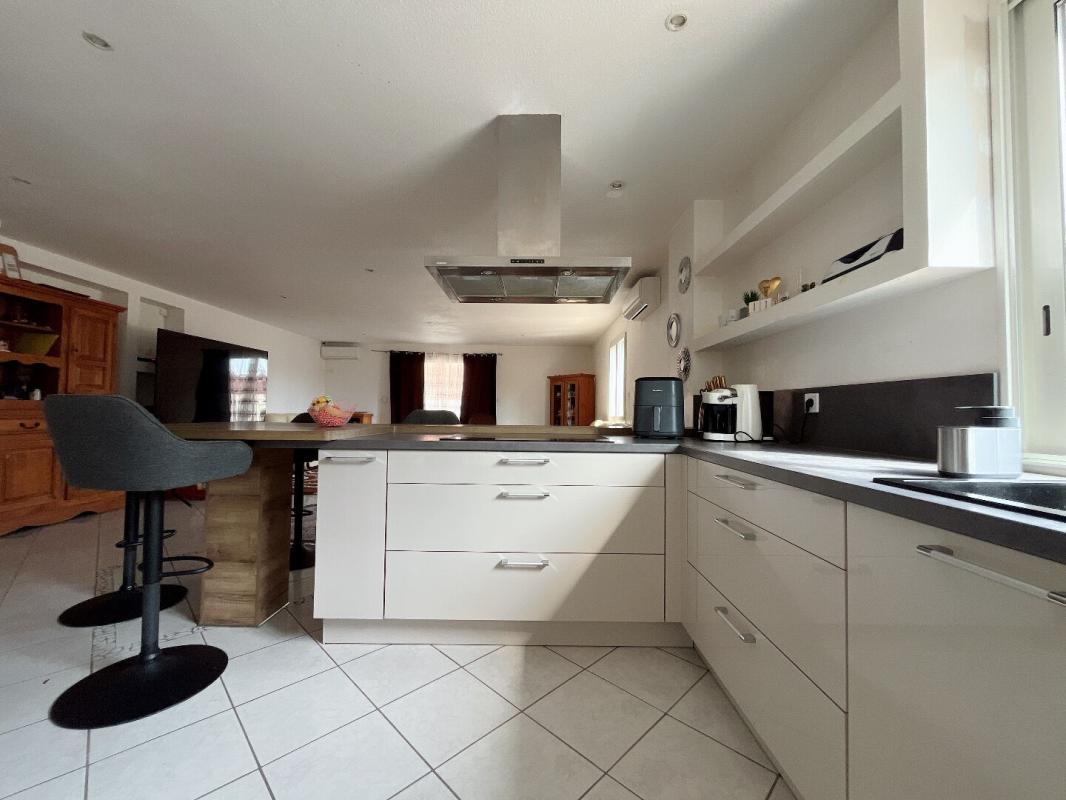 PERPIGNAN Magnifique maison en R+1 de 190 m²  comprenant 6 chambres sur un terrain 3 faces de 450 m² dans un secteur calme 6