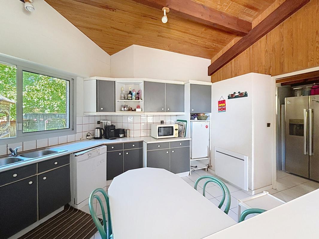 BISCARROSSE Villa 4 chambres plain-pied sur grand terrain divisible, piscine, tennis 5