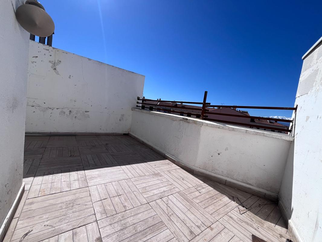 PERPIGNAN Charmant appartement de type loft au dernier étage d'une résidence de standing avec petite terrasse 1