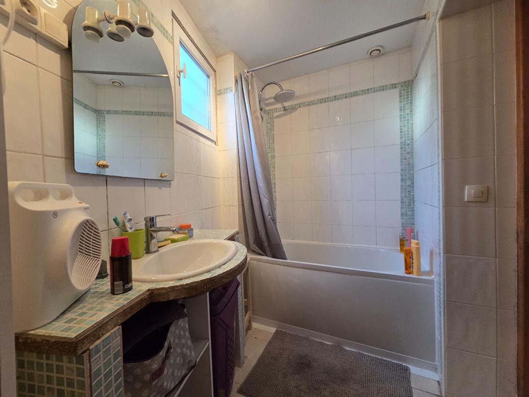 BAUDREVILLE Maison 4 pièce(s) 82 m2 7