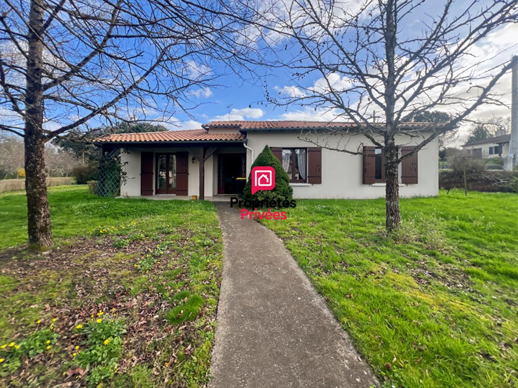 AUROS Maison de plain-pied - 3 chambres - garage et jardin 1