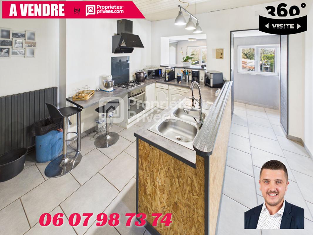 SAINT-MICHEL Grande maison avec terrain, garage et deux logements indépendants 5