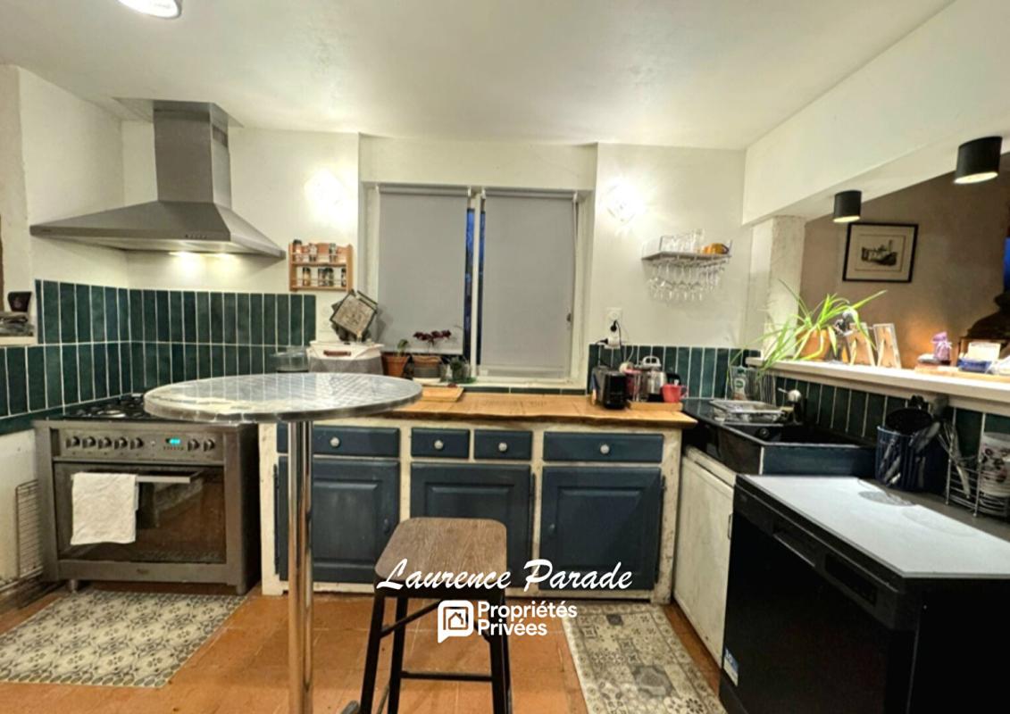 RAUZAN Maison en pierre avec garage et cave 6