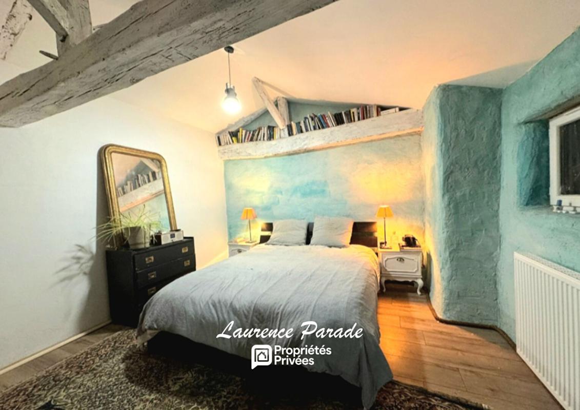 RAUZAN Maison en pierre avec garage et cave 7