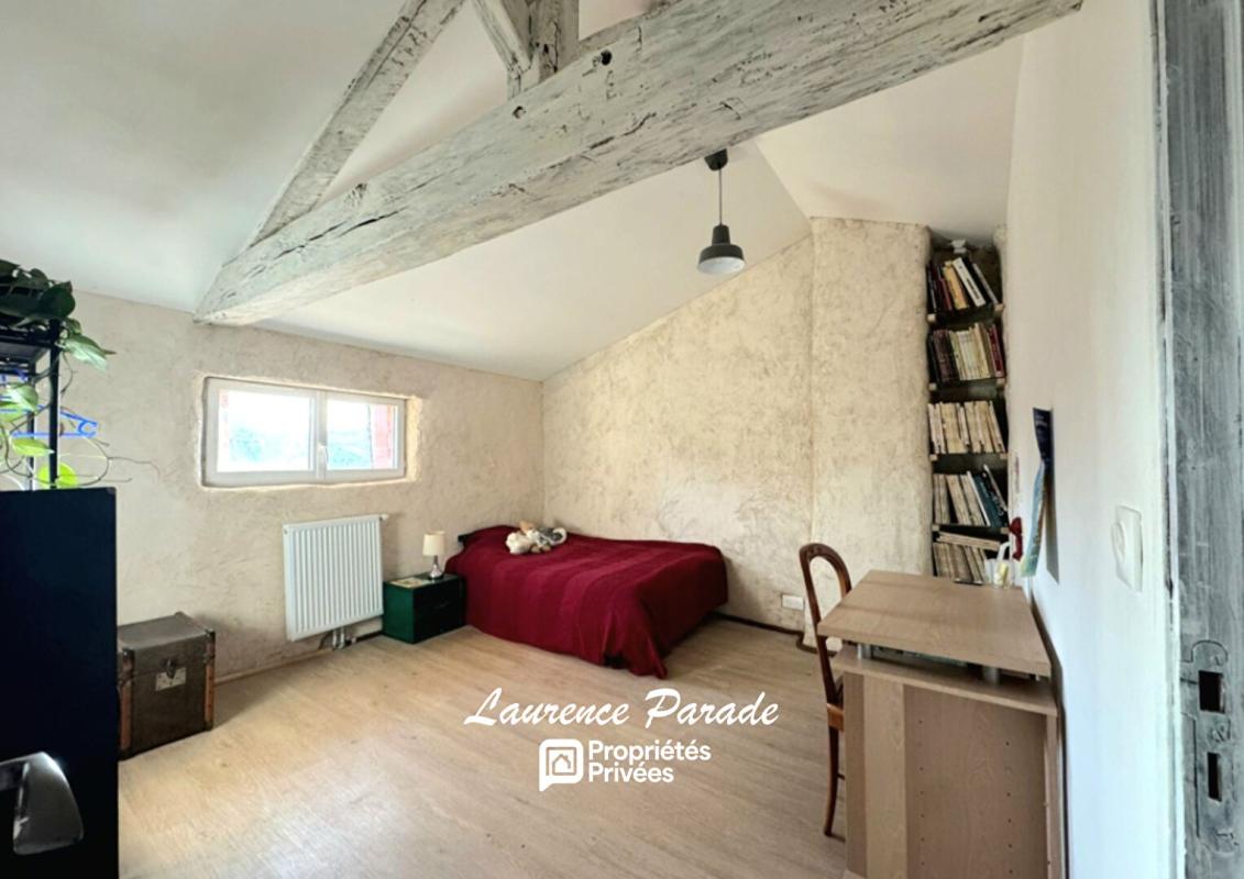 RAUZAN Maison en pierre avec garage et cave 8