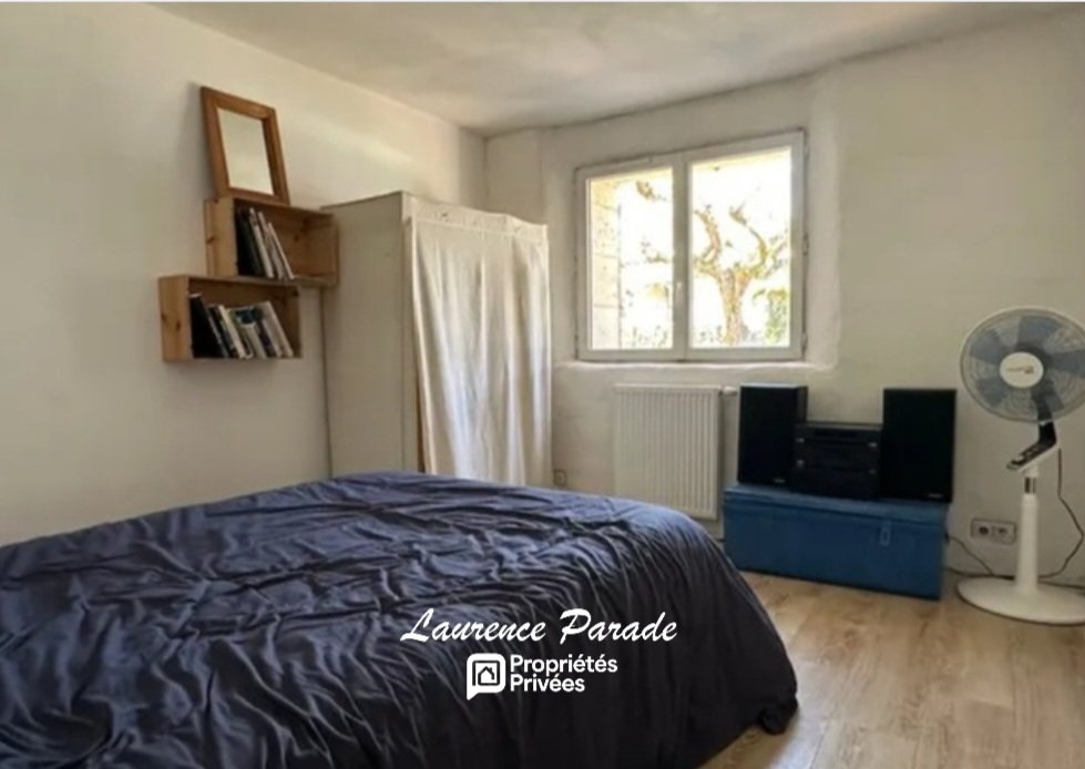 RAUZAN Maison en pierre avec garage et cave 9