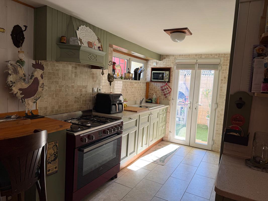 MIRAMONT-DE-GUYENNE Maison spacieuse composée de deux logements indépendants avec jardin de ville clos 8