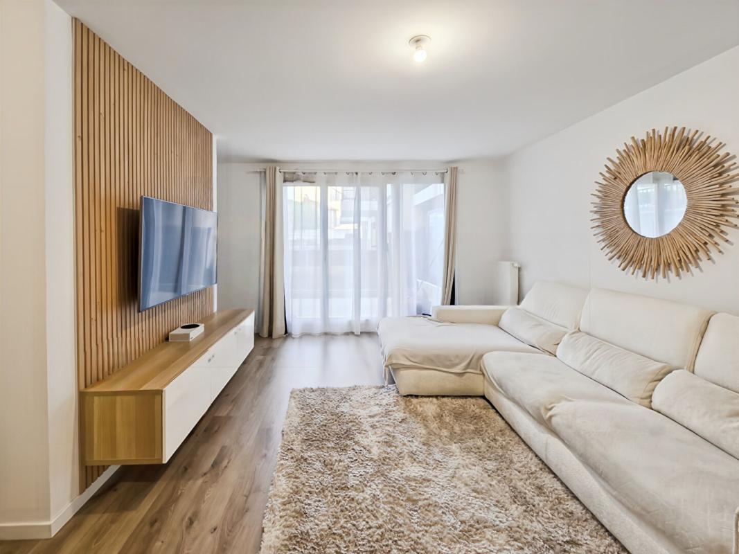 BROU-SUR-CHANTEREINE Appartement 3 pièces de 71 m2 avec jardin et 2 places de stationnement en sous-sol 1