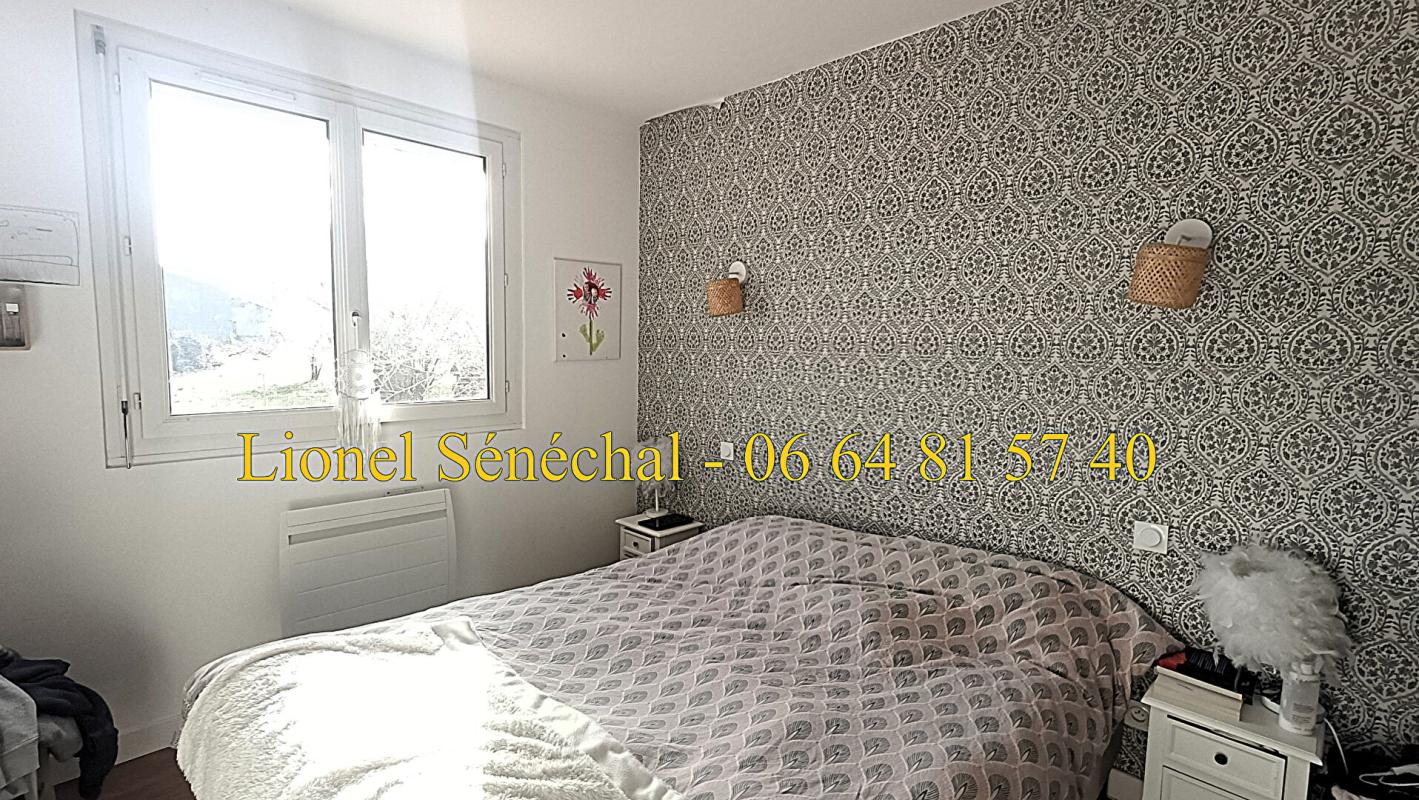 SAVIGNE-L'EVEQUE Maison lumineuse entièrement rénovée et peu énergivore de 85 m2 sur une parcelle de plus de 600 m2 4