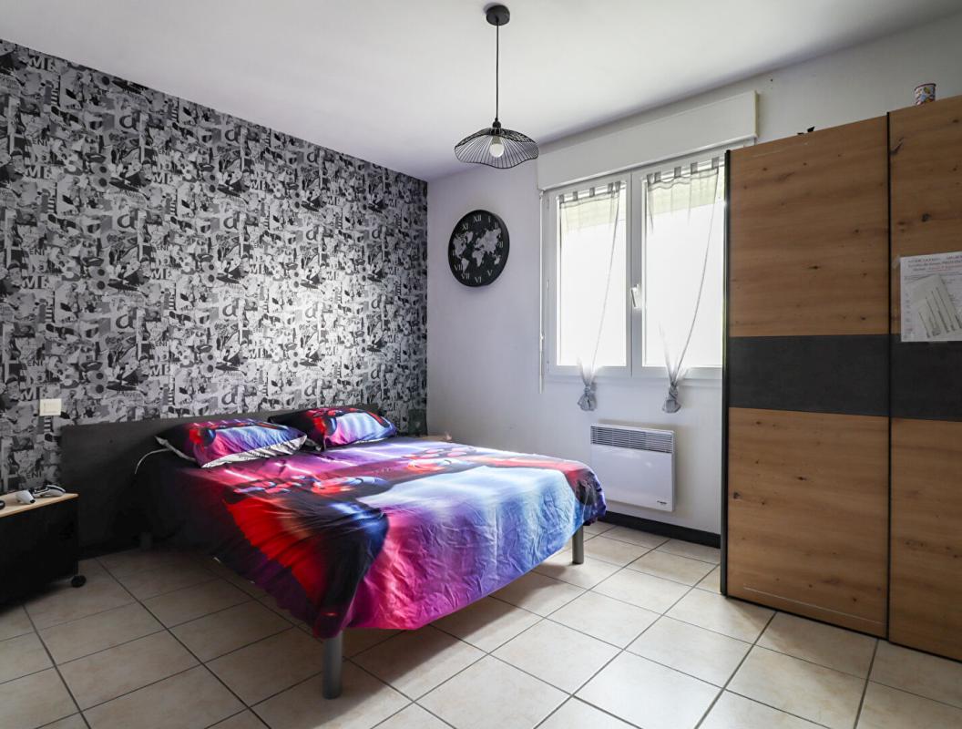 AIGUEFONDE Maison de plain-pied 76 m²  - 2 chambres - Jardin - Garage - Environnement calme 8