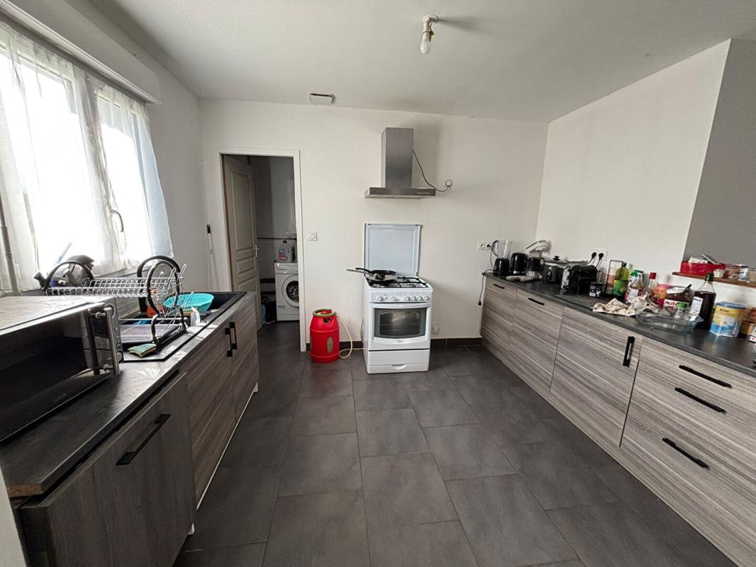 SICHAMPS Maison Sichamps 5 pièces 92.9 m2 - 3 chambres - louée - Investisseurs 4