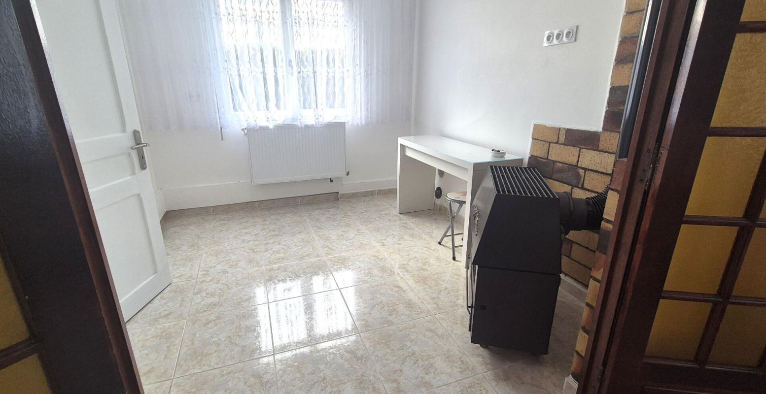 SAINT-DIZIER Belle Maison en Pierre ou de Caractère de 112 m² Rénovée avec Goût avec sa Cour fermée de 12 m², Terrasse de 56 m², Vérandas Chauffées, Garage de 32 m² avec Buanderie, Chaufferie PAC Air-Eau, Cuisine d'été et Terrain clos, arborés de 286 m² avec son Barbe 9