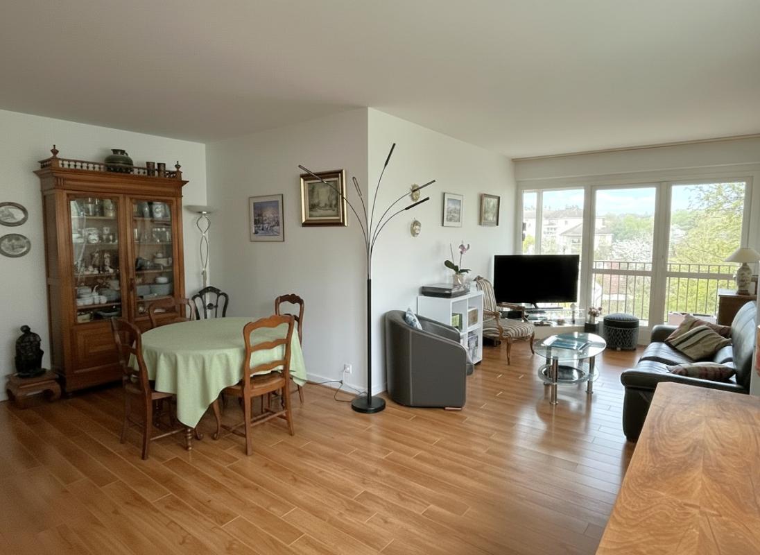 POISSY Appartement  de 111m² avec 3 chambres, un bureau, balcon, 2 box et une cave dans résidence de standing 1