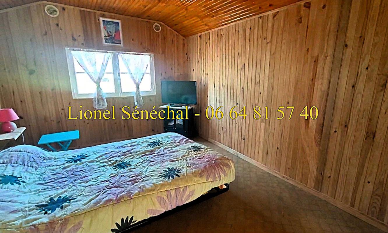 NEUVILLE-SUR-SARTHE Terrain de loisirs de plus de 500 m2 + un chalet de loisirs en dur de 24 m2  avec un accès direct à la rivière 7