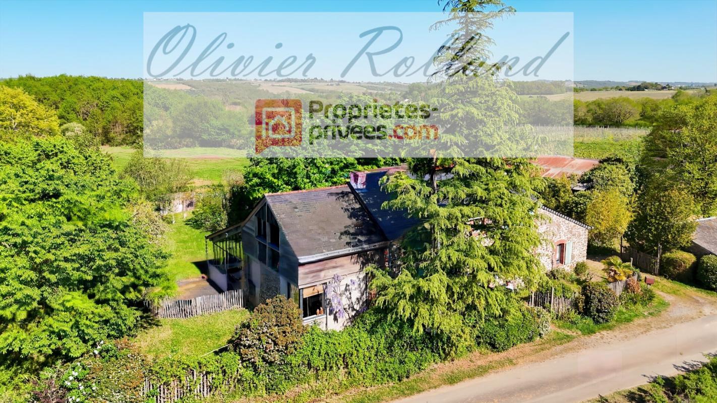 RABLAY-SUR-LAYON Écrin de Verdure et Authenticité : Demeure de Caractère de 212 m² à Rablay sur Layon 2