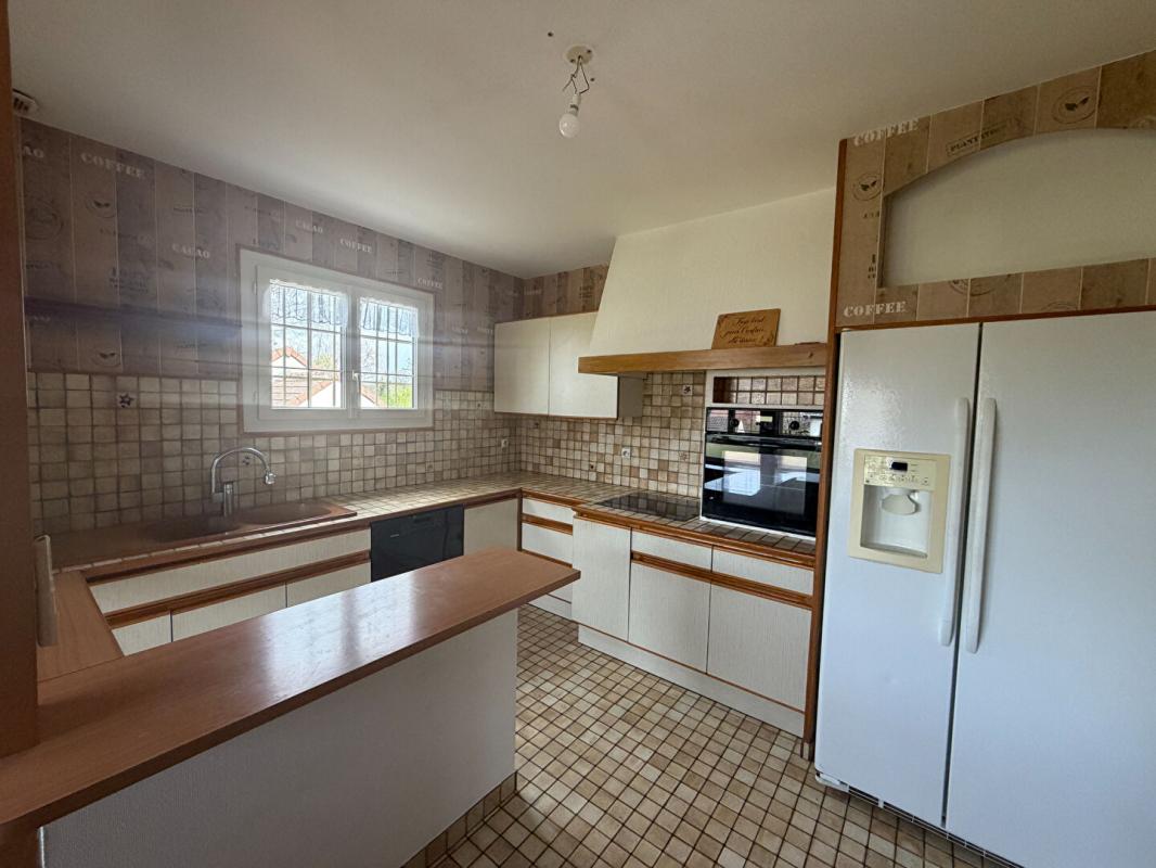 VARENNES-VAUZELLES Très joli pavillon sur sous sol dans un secteur calme de Varennes Vauzelles 11