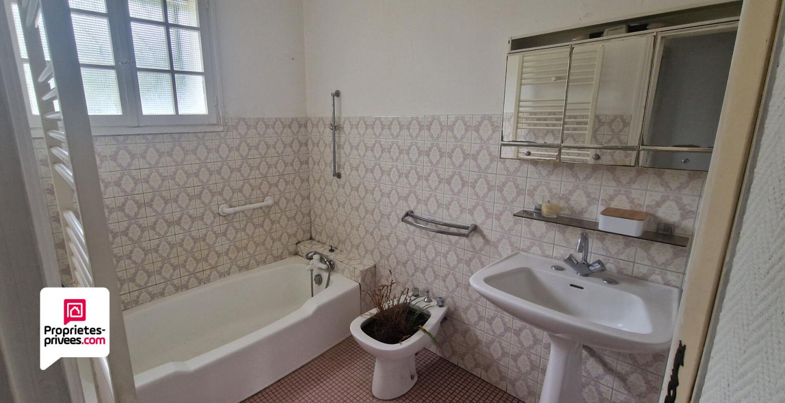 LANGON Maison de plain-pied de 120m² - 3 chambres - Garage - Dépendances - Terrain arboré de 2070m² 8