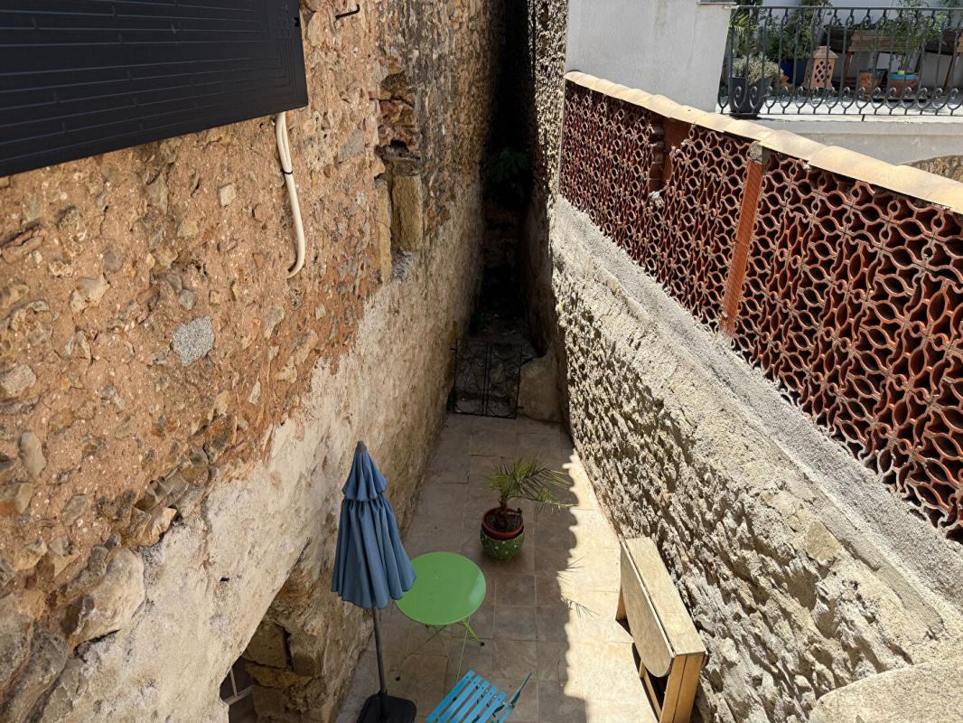 PUISSERGUIER Maison avec appartement, garage et cour à Puisserguier 16