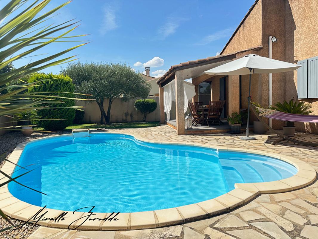 REDESSAN Maison Redessan 5 pièces 3 chambres de101 m² avec piscine terrasse et garage 1