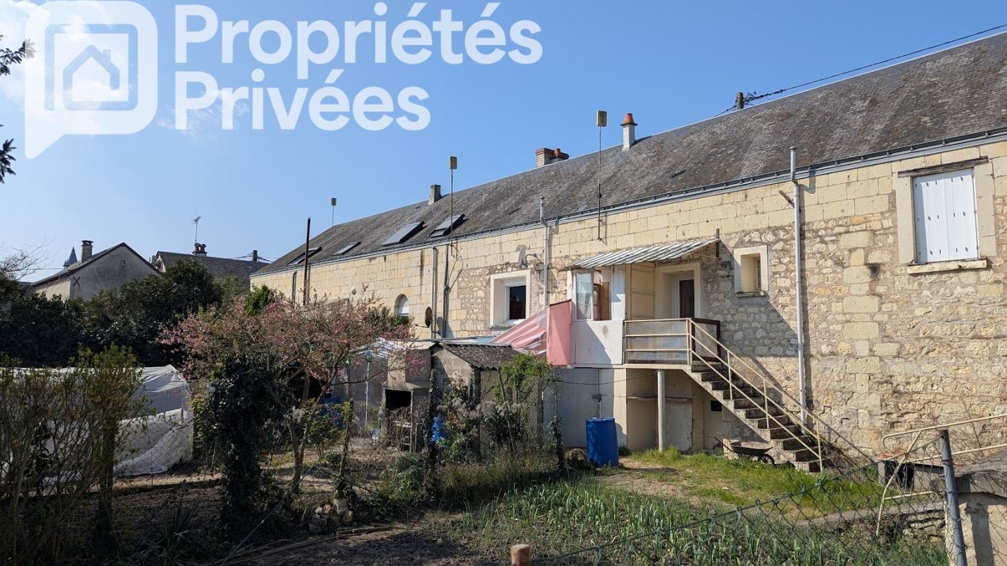 CHOUZE-SUR-LOIRE Chouzé sur Loire .Ensemble immobilier de 7 logements indépendants.430 M2 au total 15