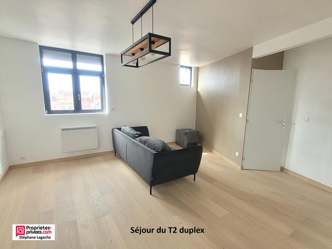 ESTAIRES Immeuble mixte Estaires avec local commercial 100m² et 1T2 duplex 8